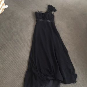 One shoulder black gown by Jim Hjelm